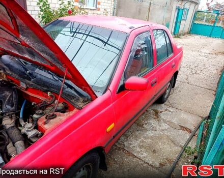 Красный Ниссан Санни, объемом двигателя 1.4 л и пробегом 435 тыс. км за 1100 $, фото 6 на Automoto.ua