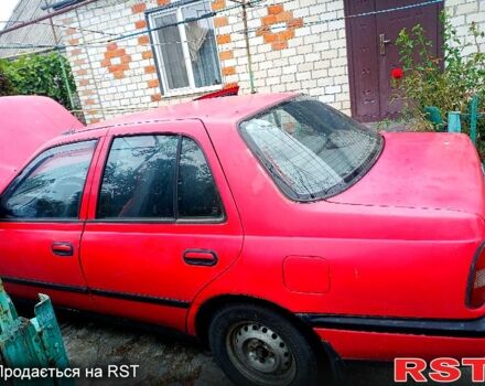 Красный Ниссан Санни, объемом двигателя 1.4 л и пробегом 435 тыс. км за 1100 $, фото 3 на Automoto.ua