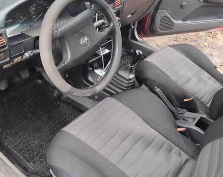 Червоний Ніссан Санні, об'ємом двигуна 2 л та пробігом 692 тис. км за 1902 $, фото 7 на Automoto.ua