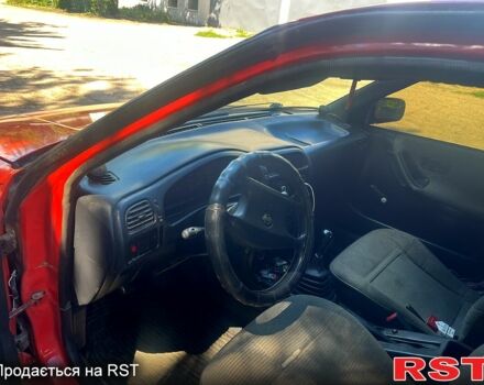 Красный Ниссан Санни, объемом двигателя 1.4 л и пробегом 260 тыс. км за 1550 $, фото 5 на Automoto.ua