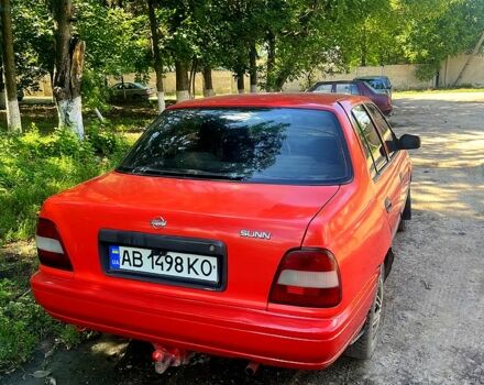 Красный Ниссан Санни, объемом двигателя 1.4 л и пробегом 260 тыс. км за 1550 $, фото 4 на Automoto.ua