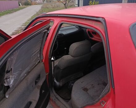 Червоний Ніссан Санні, об'ємом двигуна 1.4 л та пробігом 150 тис. км за 382 $, фото 2 на Automoto.ua