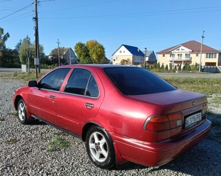 Червоний Ніссан Санні, об'ємом двигуна 1.6 л та пробігом 345 тис. км за 1650 $, фото 4 на Automoto.ua