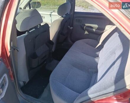 Червоний Ніссан Санні, об'ємом двигуна 1.6 л та пробігом 350 тис. км за 1650 $, фото 1 на Automoto.ua