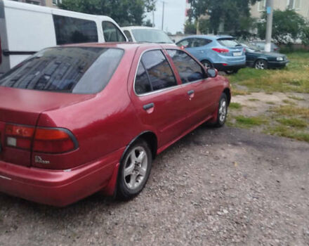 Красный Ниссан Санни, объемом двигателя 1.6 л и пробегом 300 тыс. км за 1600 $, фото 1 на Automoto.ua