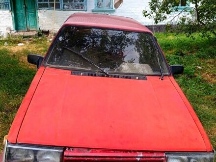 Красный Ниссан Санни, объемом двигателя 1.5 л и пробегом 160 тыс. км за 600 $, фото 1 на Automoto.ua