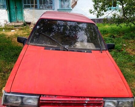 Красный Ниссан Санни, объемом двигателя 1.5 л и пробегом 160 тыс. км за 600 $, фото 1 на Automoto.ua