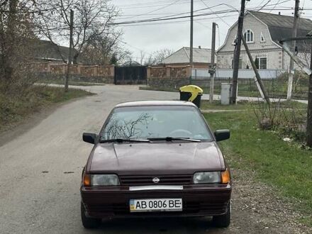 Червоний Ніссан Санні, об'ємом двигуна 1.7 л та пробігом 280 тис. км за 1450 $, фото 1 на Automoto.ua