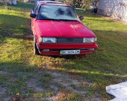 Красный Ниссан Санни, объемом двигателя 1 л и пробегом 600 тыс. км за 850 $, фото 1 на Automoto.ua