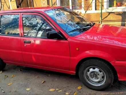 Красный Ниссан Санни, объемом двигателя 1.6 л и пробегом 1000 тыс. км за 1200 $, фото 1 на Automoto.ua