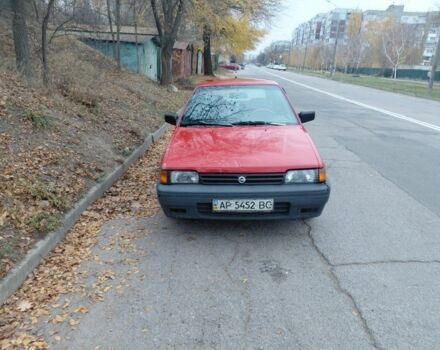 Красный Ниссан Санни, объемом двигателя 1.6 л и пробегом 235 тыс. км за 800 $, фото 1 на Automoto.ua