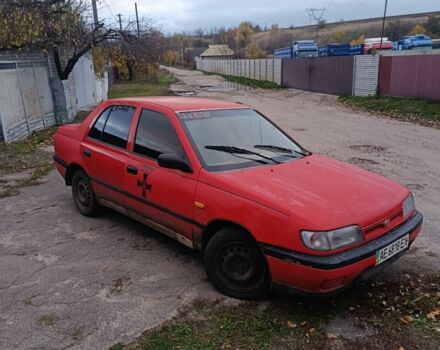 Красный Ниссан Санни, объемом двигателя 1.4 л и пробегом 150 тыс. км за 382 $, фото 1 на Automoto.ua