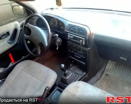 Сірий Ніссан Санні, об'ємом двигуна 1.4 л та пробігом 414 тис. км за 1750 $, фото 4 на Automoto.ua