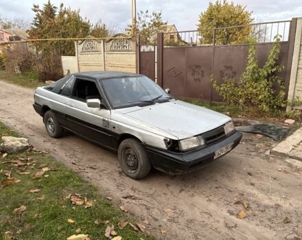 Серый Ниссан Санни, объемом двигателя 1.5 л и пробегом 580 тыс. км за 600 $, фото 5 на Automoto.ua