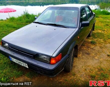 Серый Ниссан Санни, объемом двигателя 1.7 л и пробегом 100 тыс. км за 1500 $, фото 2 на Automoto.ua