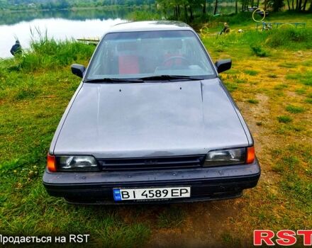 Серый Ниссан Санни, объемом двигателя 1.7 л и пробегом 100 тыс. км за 1500 $, фото 1 на Automoto.ua