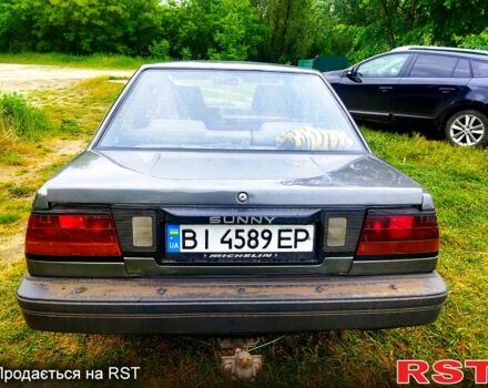 Серый Ниссан Санни, объемом двигателя 1.7 л и пробегом 100 тыс. км за 1500 $, фото 3 на Automoto.ua