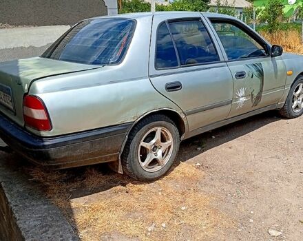 Серый Ниссан Санни, объемом двигателя 2 л и пробегом 211 тыс. км за 900 $, фото 1 на Automoto.ua