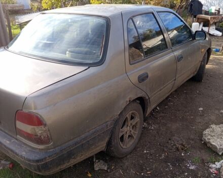 Сірий Ніссан Санні, об'ємом двигуна 1.5 л та пробігом 200 тис. км за 1200 $, фото 3 на Automoto.ua