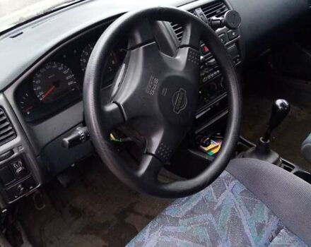 Серый Ниссан Санни, объемом двигателя 1.4 л и пробегом 370 тыс. км за 950 $, фото 10 на Automoto.ua