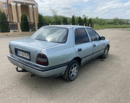 Серый Ниссан Санни, объемом двигателя 2 л и пробегом 400 тыс. км за 1000 $, фото 2 на Automoto.ua