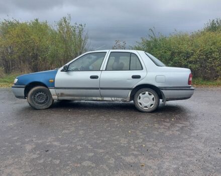 Сірий Ніссан Санні, об'ємом двигуна 1.4 л та пробігом 250 тис. км за 1500 $, фото 4 на Automoto.ua
