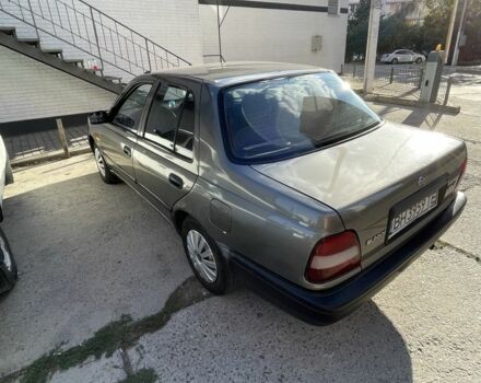 Серый Ниссан Санни, объемом двигателя 1.4 л и пробегом 325 тыс. км за 1100 $, фото 4 на Automoto.ua