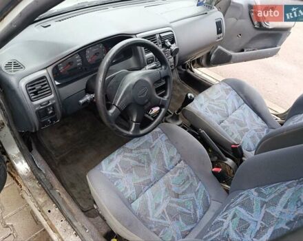 Серый Ниссан Санни, объемом двигателя 1.4 л и пробегом 270 тыс. км за 745 $, фото 5 на Automoto.ua