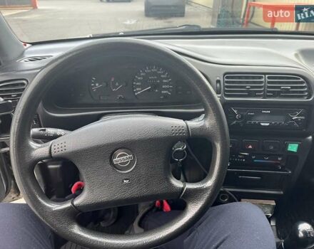 Серый Ниссан Санни, объемом двигателя 1.39 л и пробегом 250 тыс. км за 1700 $, фото 3 на Automoto.ua