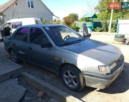 Серый Ниссан Санни, объемом двигателя 1.39 л и пробегом 300 тыс. км за 1700 $, фото 1 на Automoto.ua