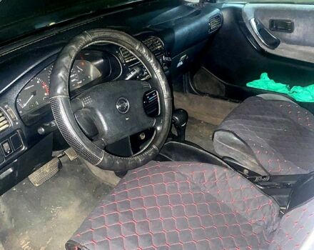 Серый Ниссан Санни, объемом двигателя 1.3 л и пробегом 300 тыс. км за 1200 $, фото 3 на Automoto.ua