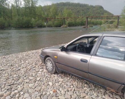 Серый Ниссан Санни, объемом двигателя 1 л и пробегом 303 тыс. км за 430 $, фото 10 на Automoto.ua