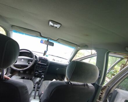 Серый Ниссан Санни, объемом двигателя 1 л и пробегом 303 тыс. км за 430 $, фото 17 на Automoto.ua