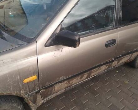 Серый Ниссан Санни, объемом двигателя 1.6 л и пробегом 303 тыс. км за 450 $, фото 2 на Automoto.ua