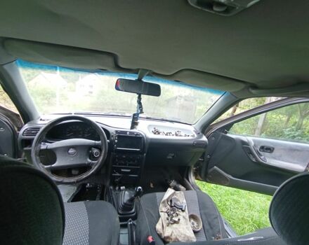 Серый Ниссан Санни, объемом двигателя 1 л и пробегом 303 тыс. км за 430 $, фото 16 на Automoto.ua