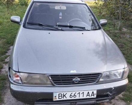 Серый Ниссан Санни, объемом двигателя 1.6 л и пробегом 999 тыс. км за 600 $, фото 1 на Automoto.ua