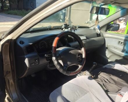 Серый Ниссан Санни, объемом двигателя 1.6 л и пробегом 427 тыс. км за 2000 $, фото 4 на Automoto.ua