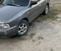 Серый Ниссан Санни, объемом двигателя 2 л и пробегом 450 тыс. км за 1000 $, фото 1 на Automoto.ua
