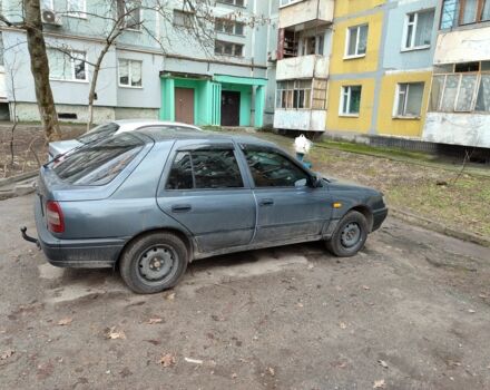 Сірий Ніссан Санні, об'ємом двигуна 2 л та пробігом 260 тис. км за 828 $, фото 3 на Automoto.ua