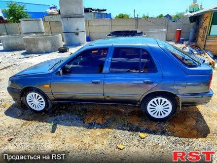 Серый Ниссан Санни, объемом двигателя 2 л и пробегом 450 тыс. км за 850 $, фото 1 на Automoto.ua
