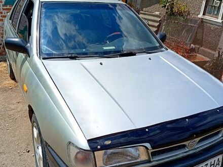 Сірий Ніссан Санні, об'ємом двигуна 2 л та пробігом 211 тис. км за 900 $, фото 1 на Automoto.ua