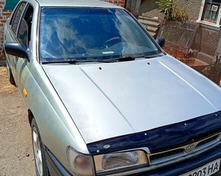 Сірий Ніссан Санні, об'ємом двигуна 2 л та пробігом 211 тис. км за 900 $, фото 1 на Automoto.ua