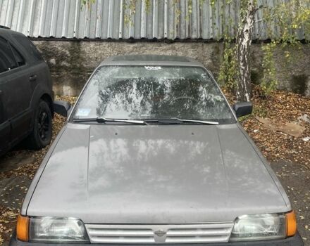 Серый Ниссан Санни, объемом двигателя 1.8 л и пробегом 244 тыс. км за 1500 $, фото 1 на Automoto.ua