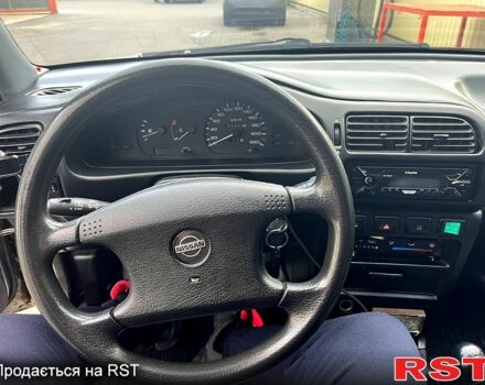 Серый Ниссан Санни, объемом двигателя 1.4 л и пробегом 250 тыс. км за 1700 $, фото 1 на Automoto.ua