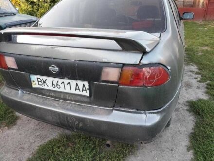 Серый Ниссан Санни, объемом двигателя 1.6 л и пробегом 999 тыс. км за 600 $, фото 1 на Automoto.ua
