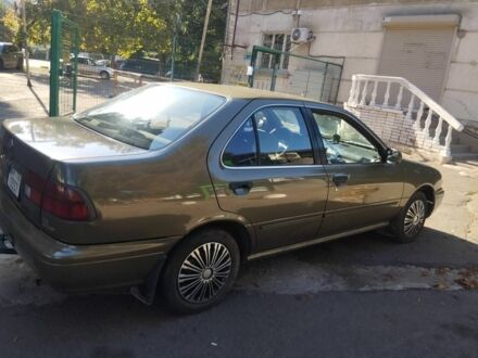 Серый Ниссан Санни, объемом двигателя 1.6 л и пробегом 427 тыс. км за 2000 $, фото 1 на Automoto.ua