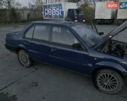 Синий Ниссан Санни, объемом двигателя 1.68 л и пробегом 300 тыс. км за 800 $, фото 8 на Automoto.ua