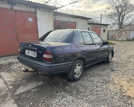 Синий Ниссан Санни, объемом двигателя 1.4 л и пробегом 400 тыс. км за 750 $, фото 1 на Automoto.ua