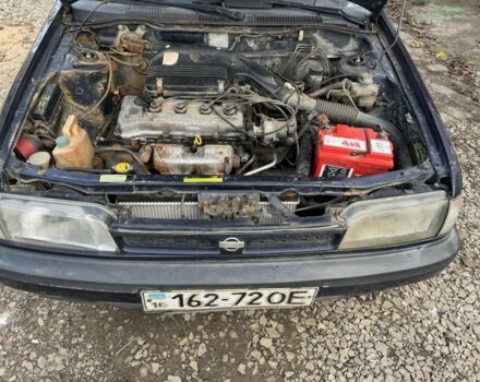 Синий Ниссан Санни, объемом двигателя 1.4 л и пробегом 400 тыс. км за 750 $, фото 5 на Automoto.ua