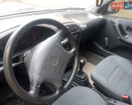 Синий Ниссан Санни, объемом двигателя 1.39 л и пробегом 325 тыс. км за 1350 $, фото 5 на Automoto.ua